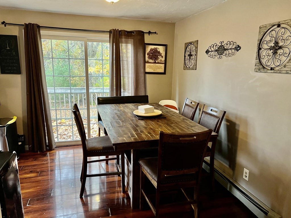 30 Tennyson Street Worcester, MA 01610 - Photo 7 of 19 a view of a dining room with furniture window and wooden floor
