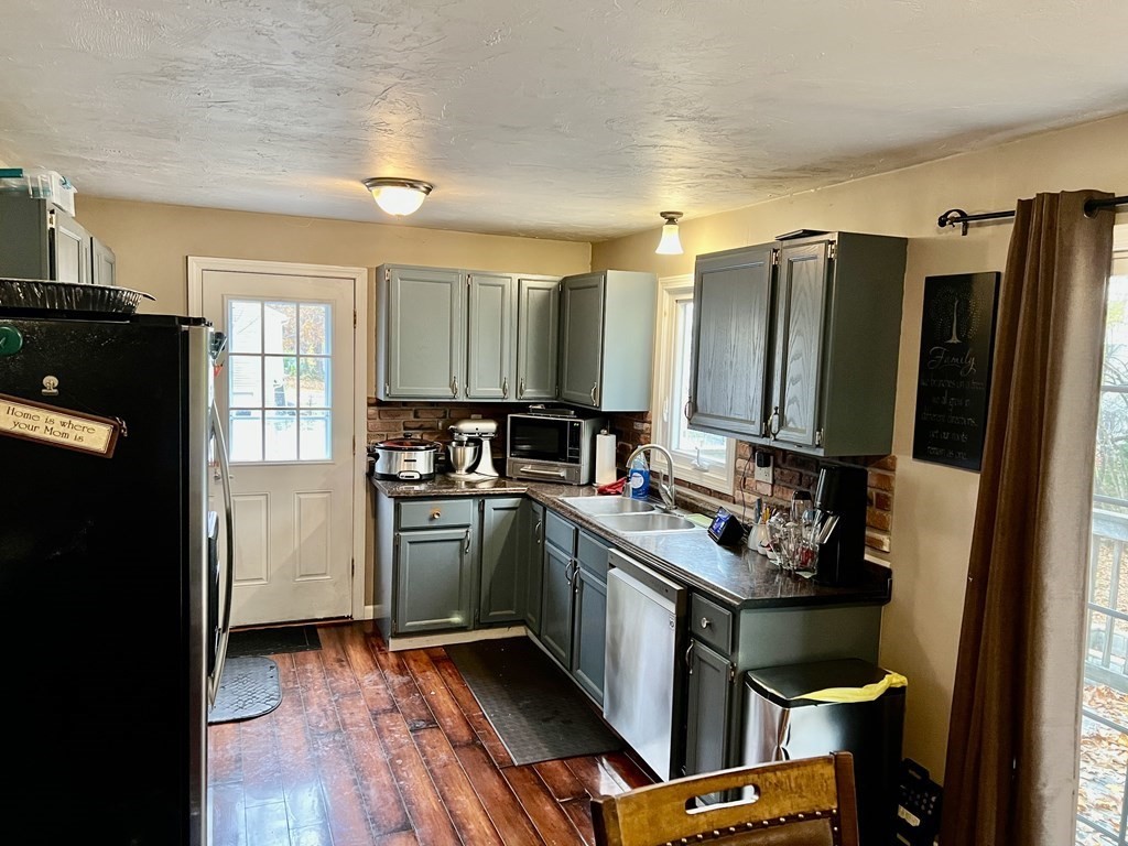 30 Tennyson Street Worcester, MA 01610 - Photo 8 of 19 a kitchen with a sink appliances and cabinets