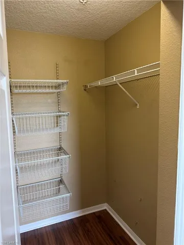 a view of a room with racks on the wall