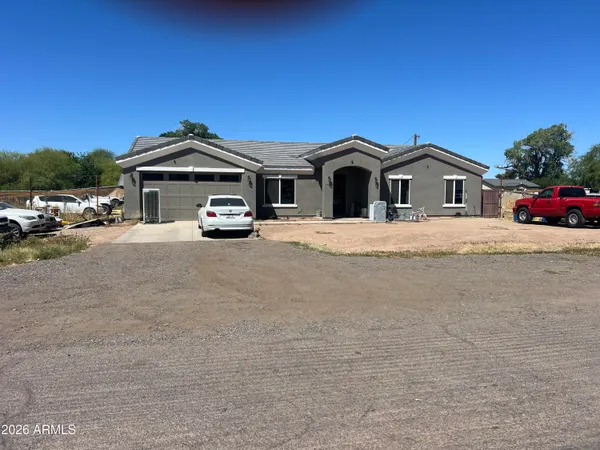 a car parked in front of a house