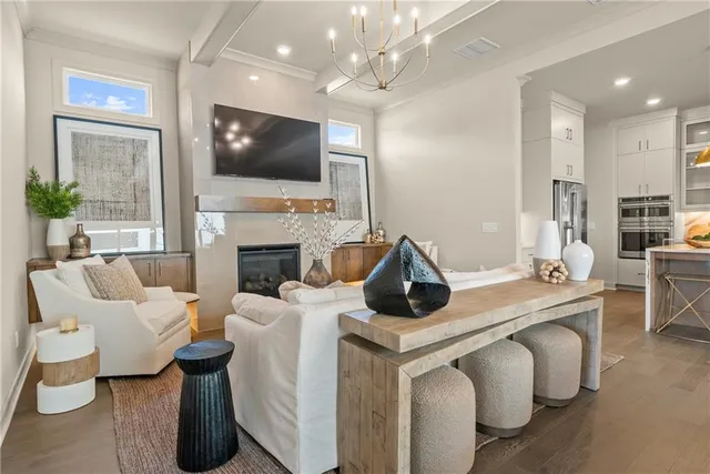 a living room with furniture fireplace and a flat screen tv