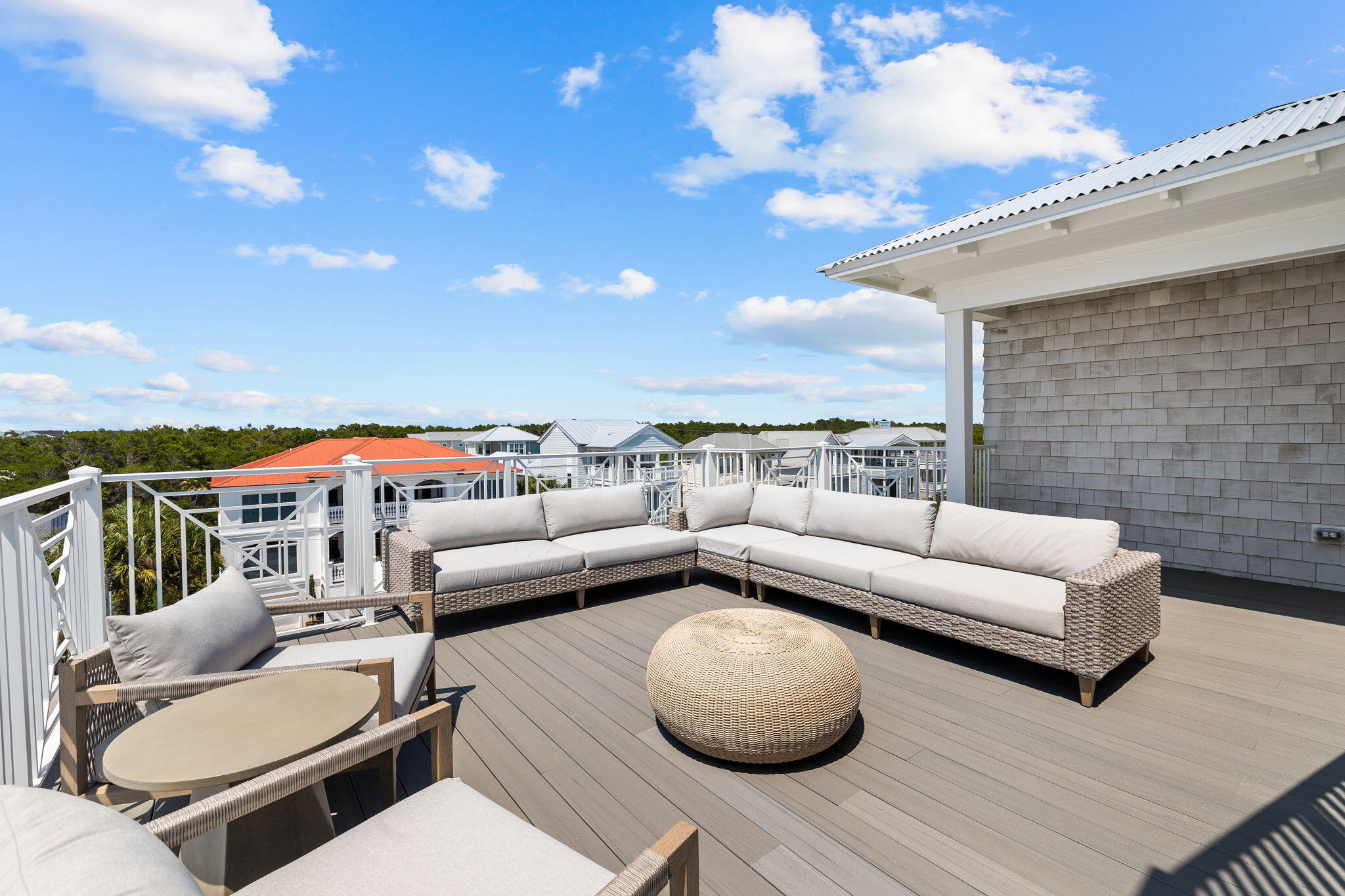 55 Pompano Street Inlet Beach, FL 32461 - Photo 102 of 122 a roof deck with couches and potted plants