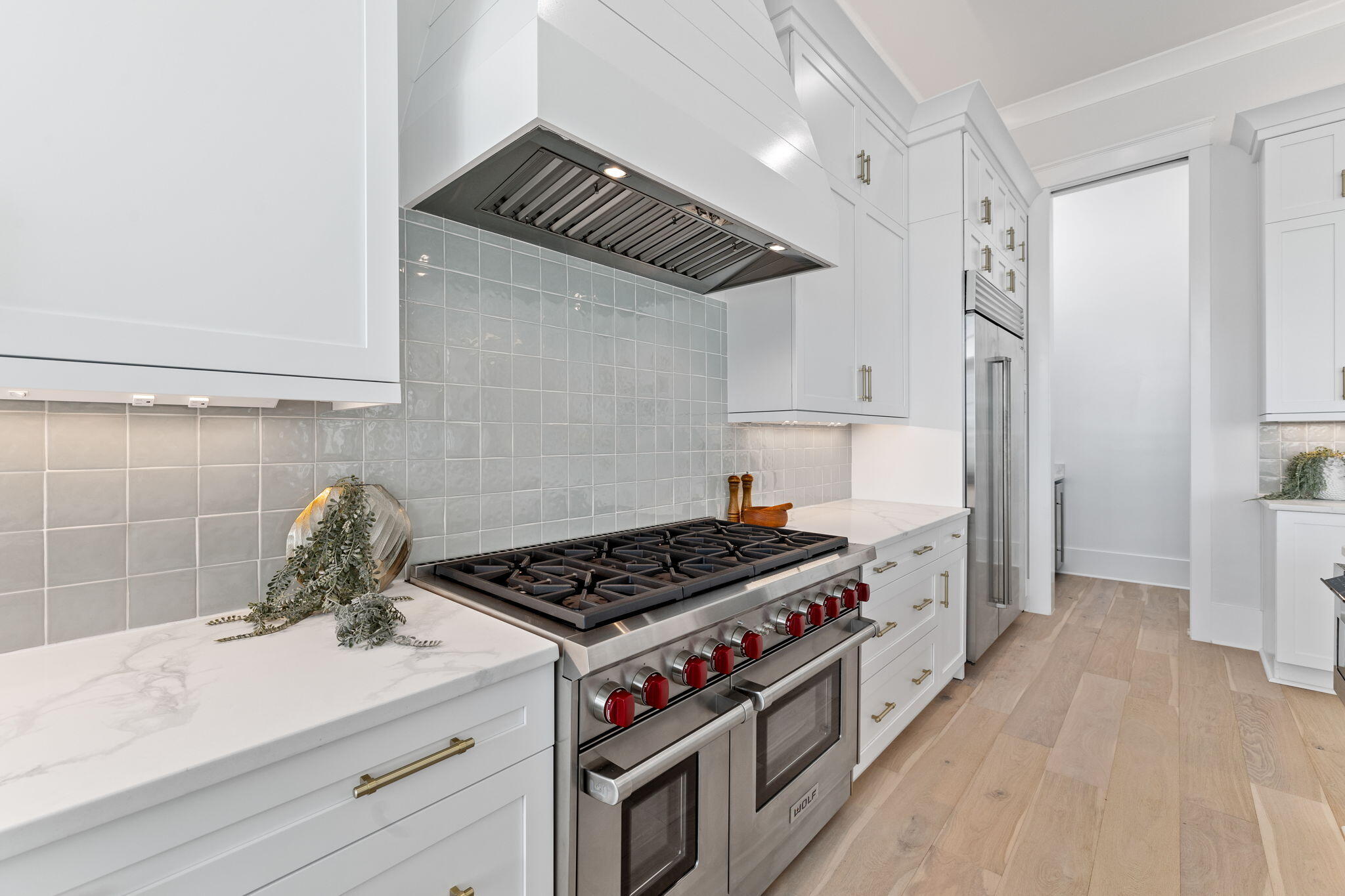 55 Pompano Street Inlet Beach, FL 32461 - Photo 18 of 122 a kitchen with stainless steel appliances granite countertop a stove and a refrigerator