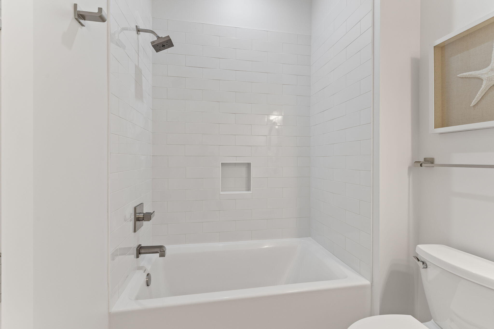 55 Pompano Street Inlet Beach, FL 32461 - Photo 42 of 122 a white bath tub sitting next to a toilet