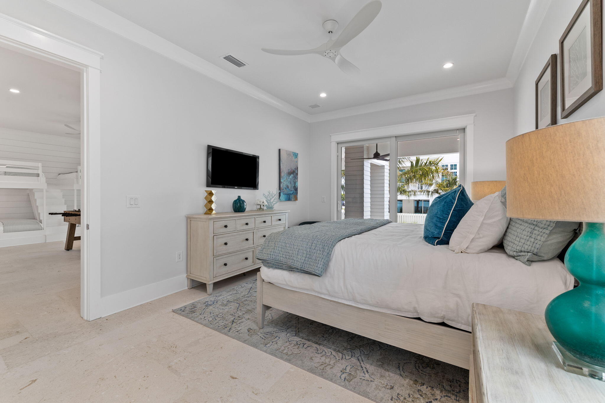 55 Pompano Street Inlet Beach, FL 32461 - Photo 44 of 122 a bedroom with a large bed and a flat tv screen