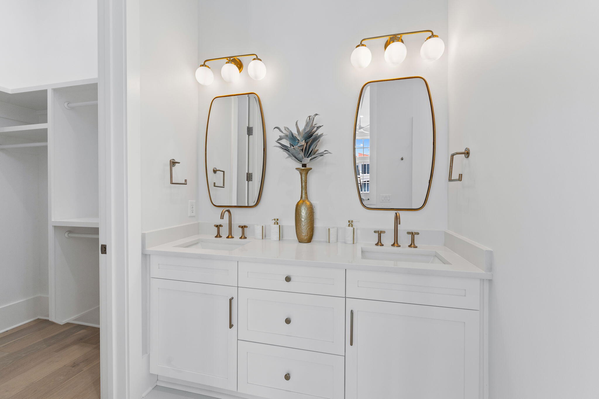 55 Pompano Street Inlet Beach, FL 32461 - Photo 52 of 122 a bathroom with double vanity sinks and a mirror