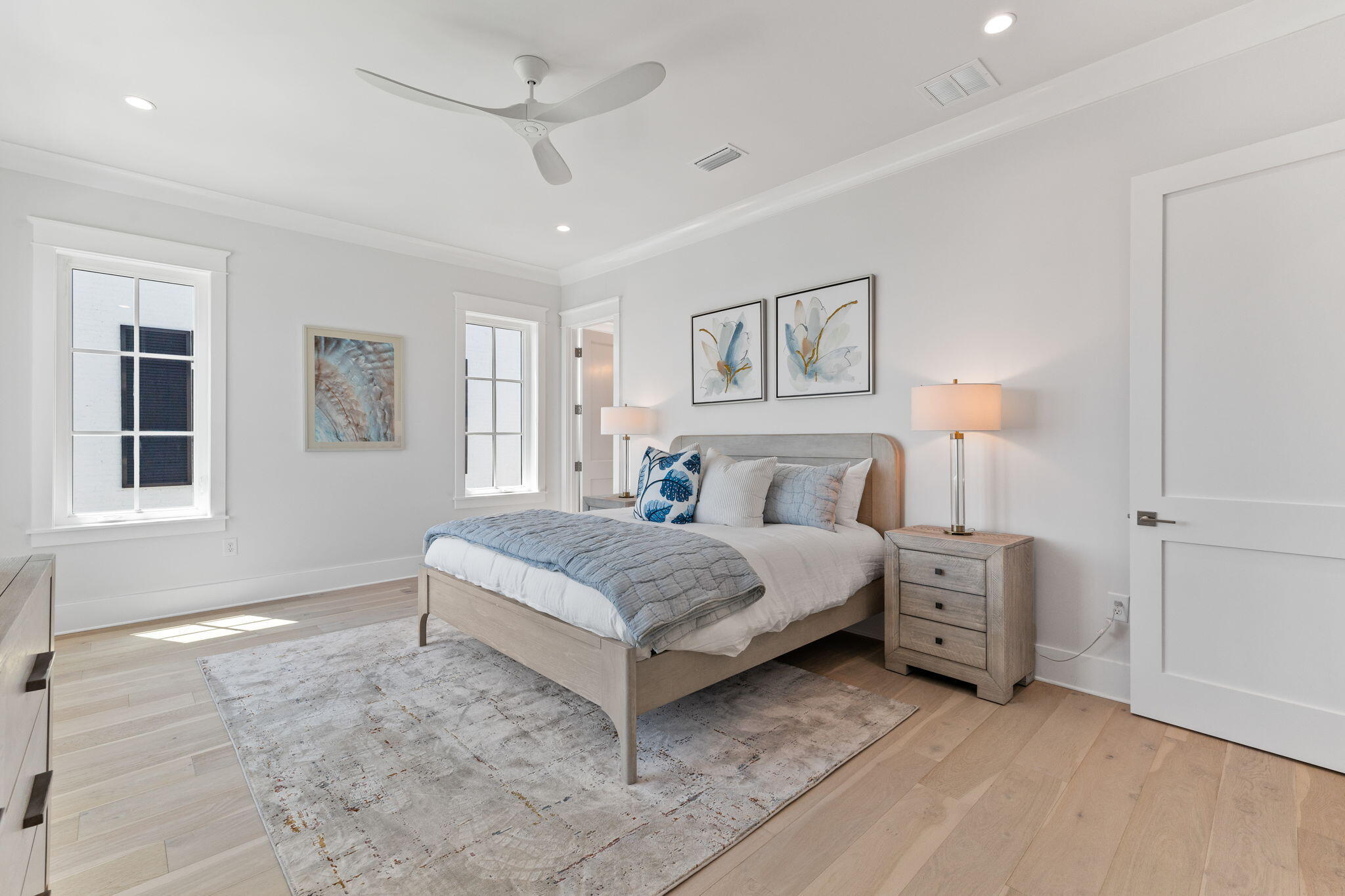 55 Pompano Street Inlet Beach, FL 32461 - Photo 67 of 122 a spacious bedroom with a bed and a window