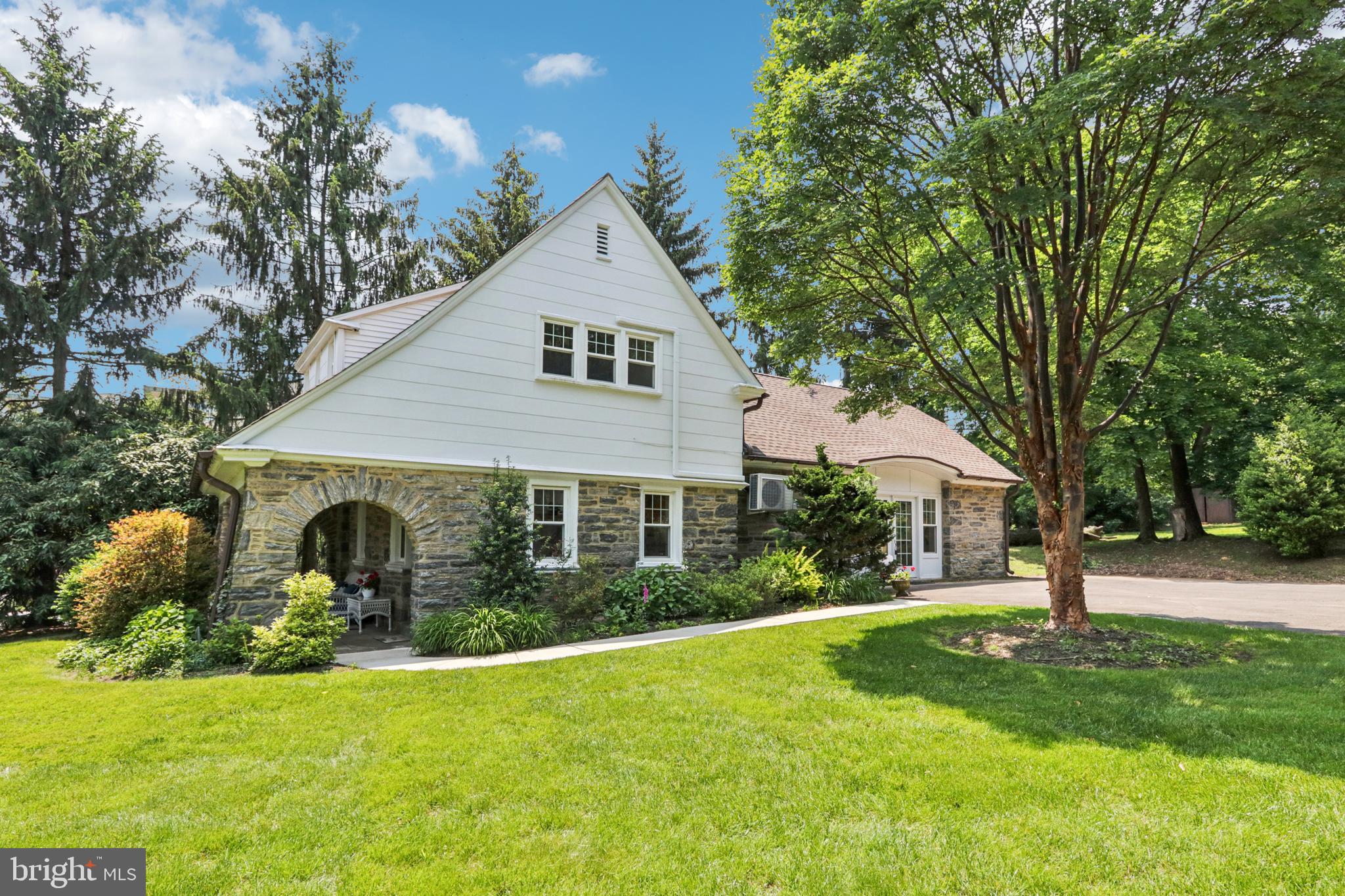 1523 Susquehanna Road Rydal, PA 19046 - Photo 4 of 69 a front view of a house with garden