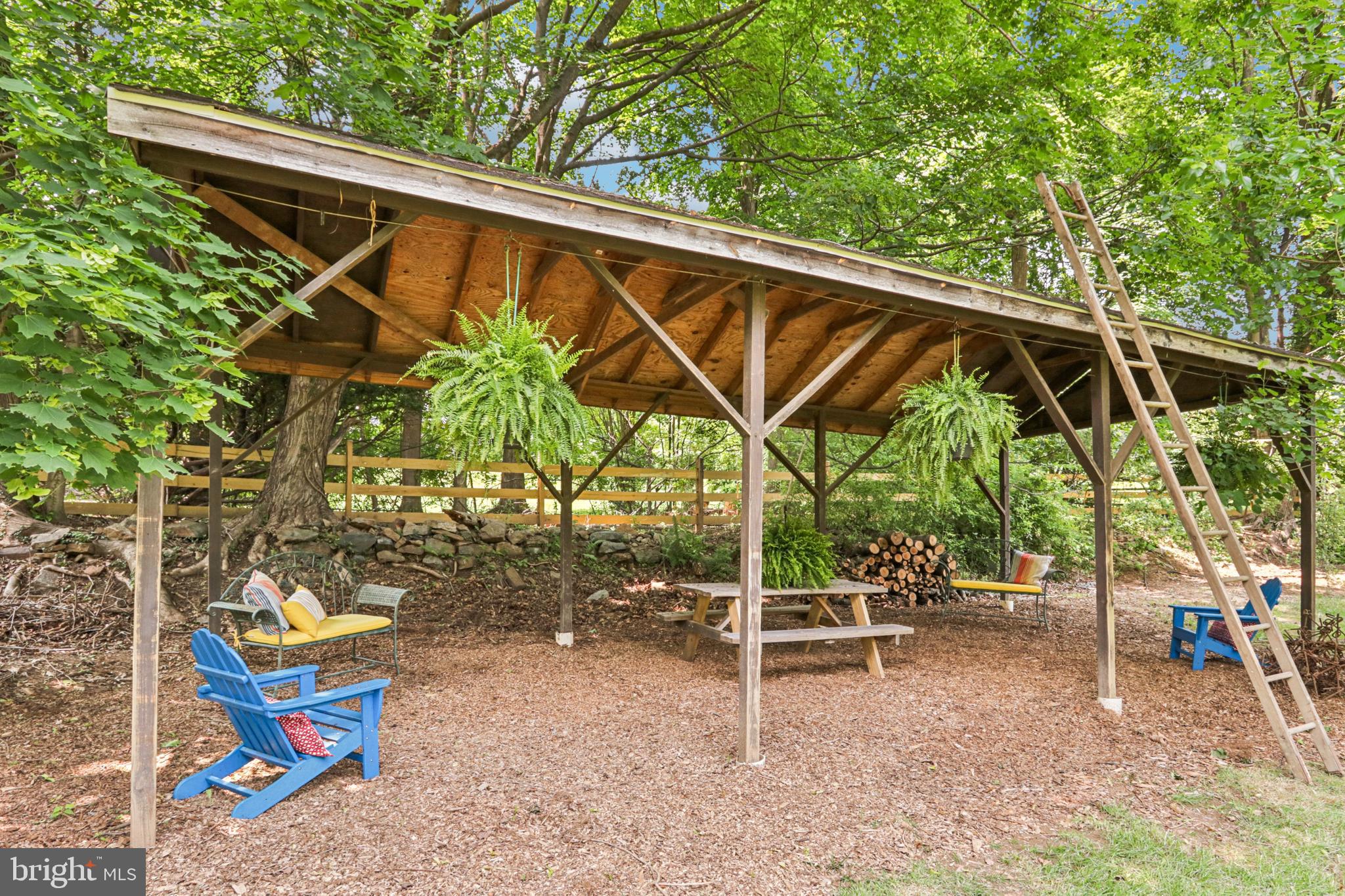 1523 Susquehanna Road Rydal, PA 19046 - Photo 47 of 69 a backyard of a house with table and chairs