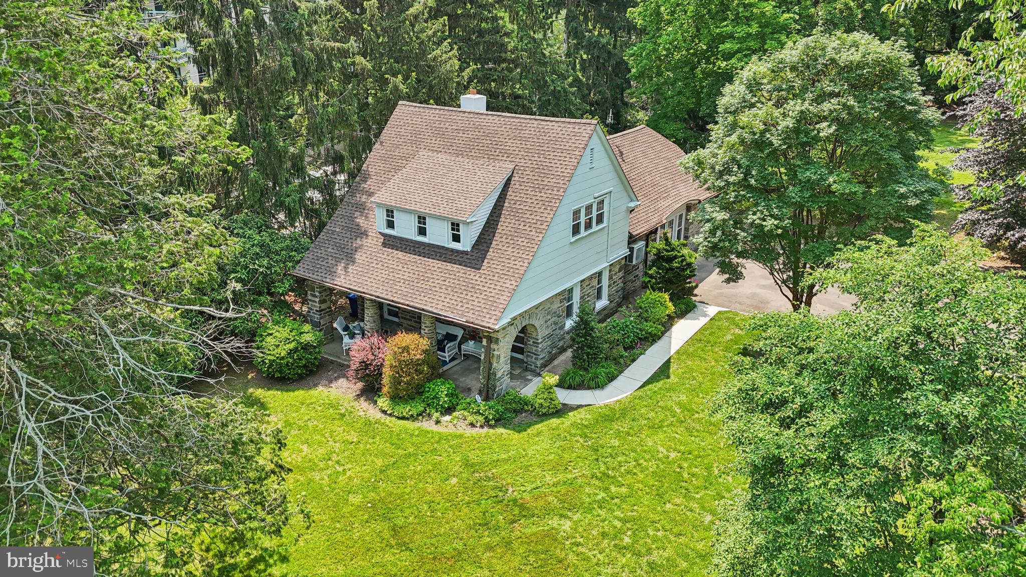 1523 Susquehanna Road Rydal, PA 19046 - Photo 60 of 69 an aerial view of a house with garden space and trees all around