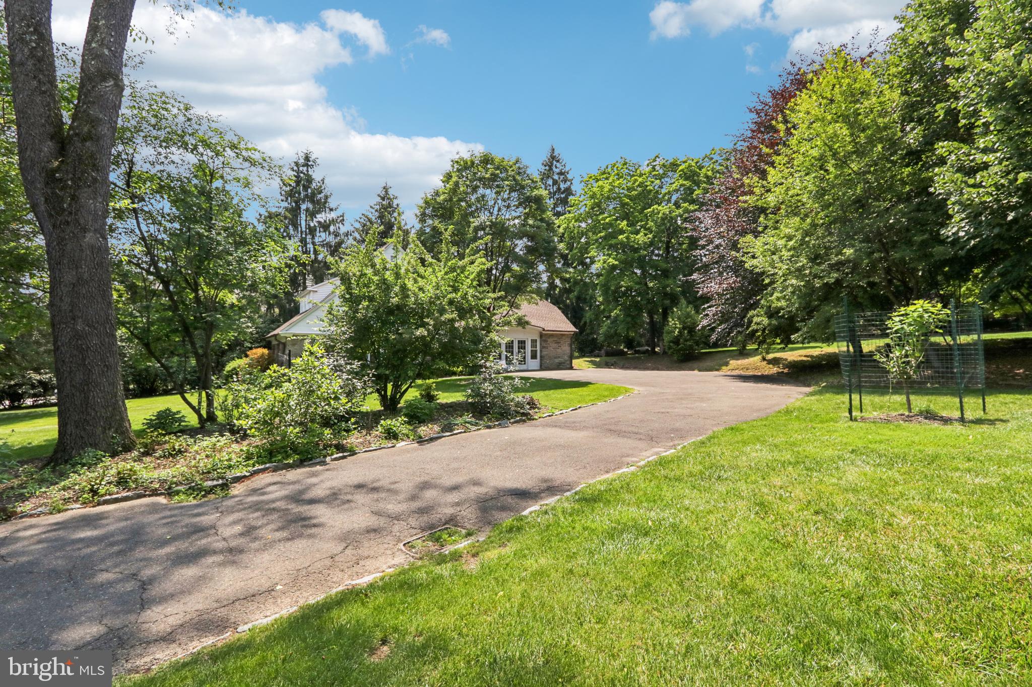 1523 Susquehanna Road Rydal, PA 19046 - Photo 65 of 69 a view of a swimming pool with a yard