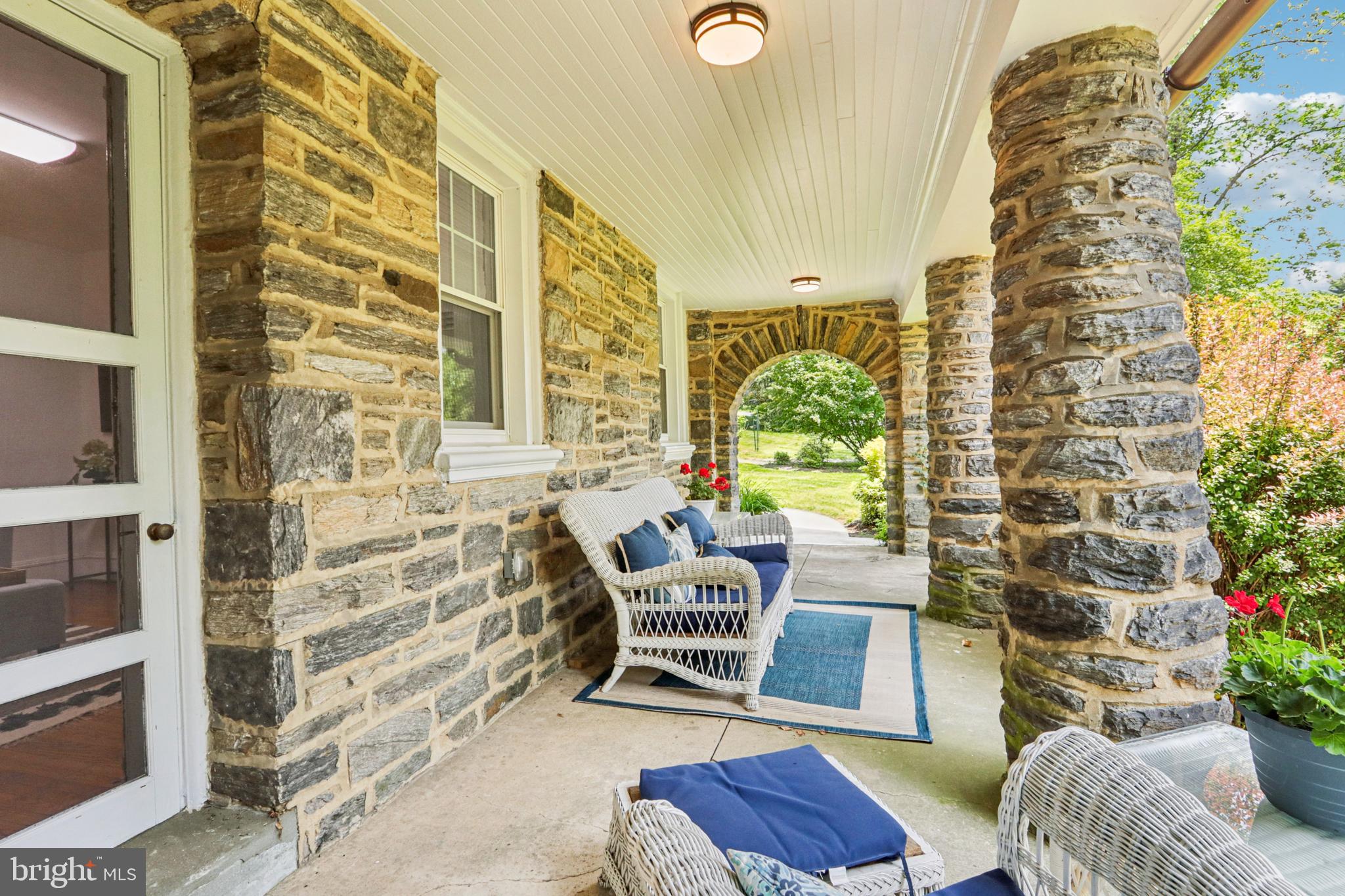 1523 Susquehanna Road Rydal, PA 19046 - Photo 9 of 69 a balcony with furniture and a potted plant
