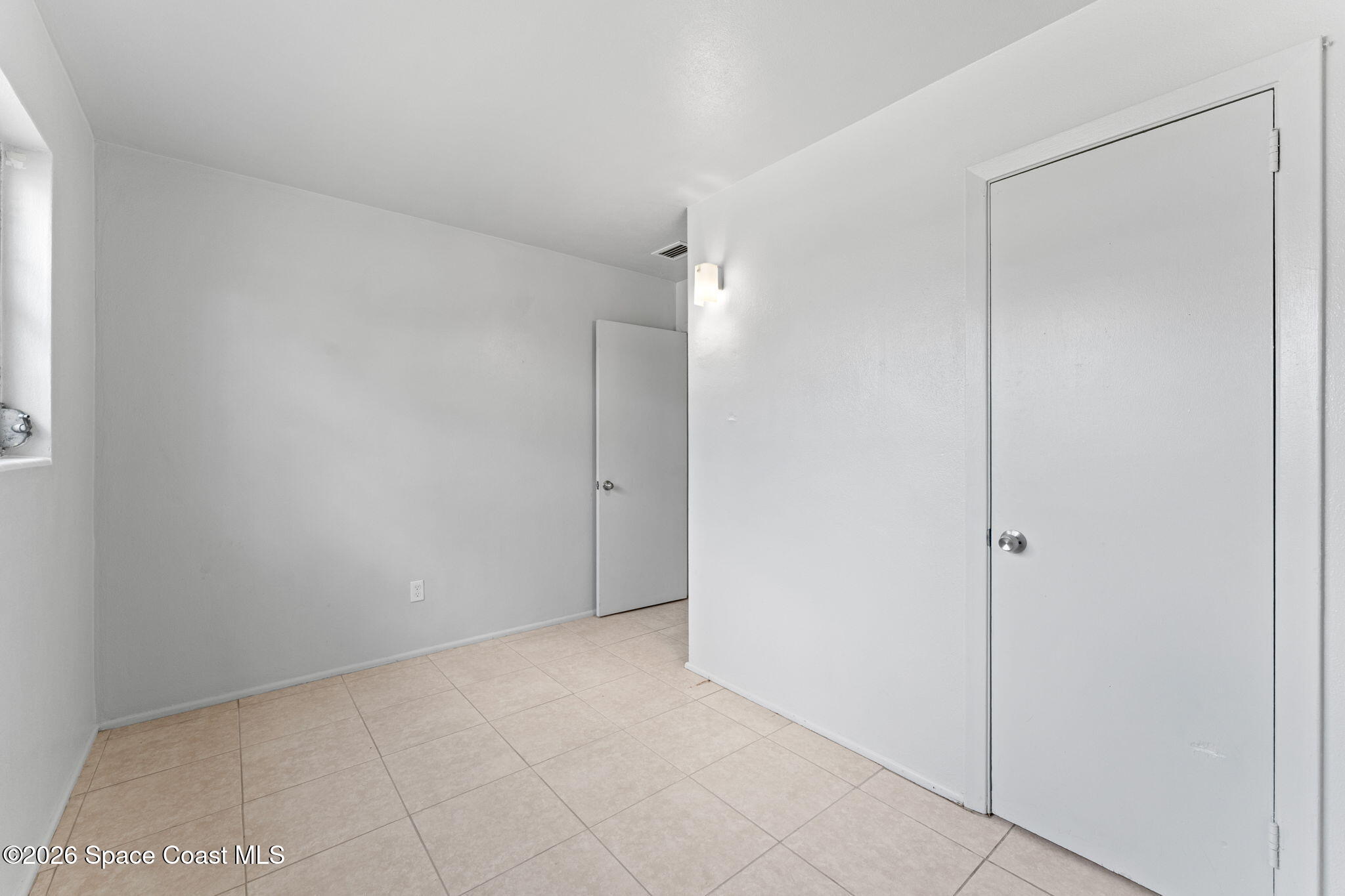 1042 Azalea Lane Cocoa, FL 32922 - Photo 14 of 26 a view of an empty room