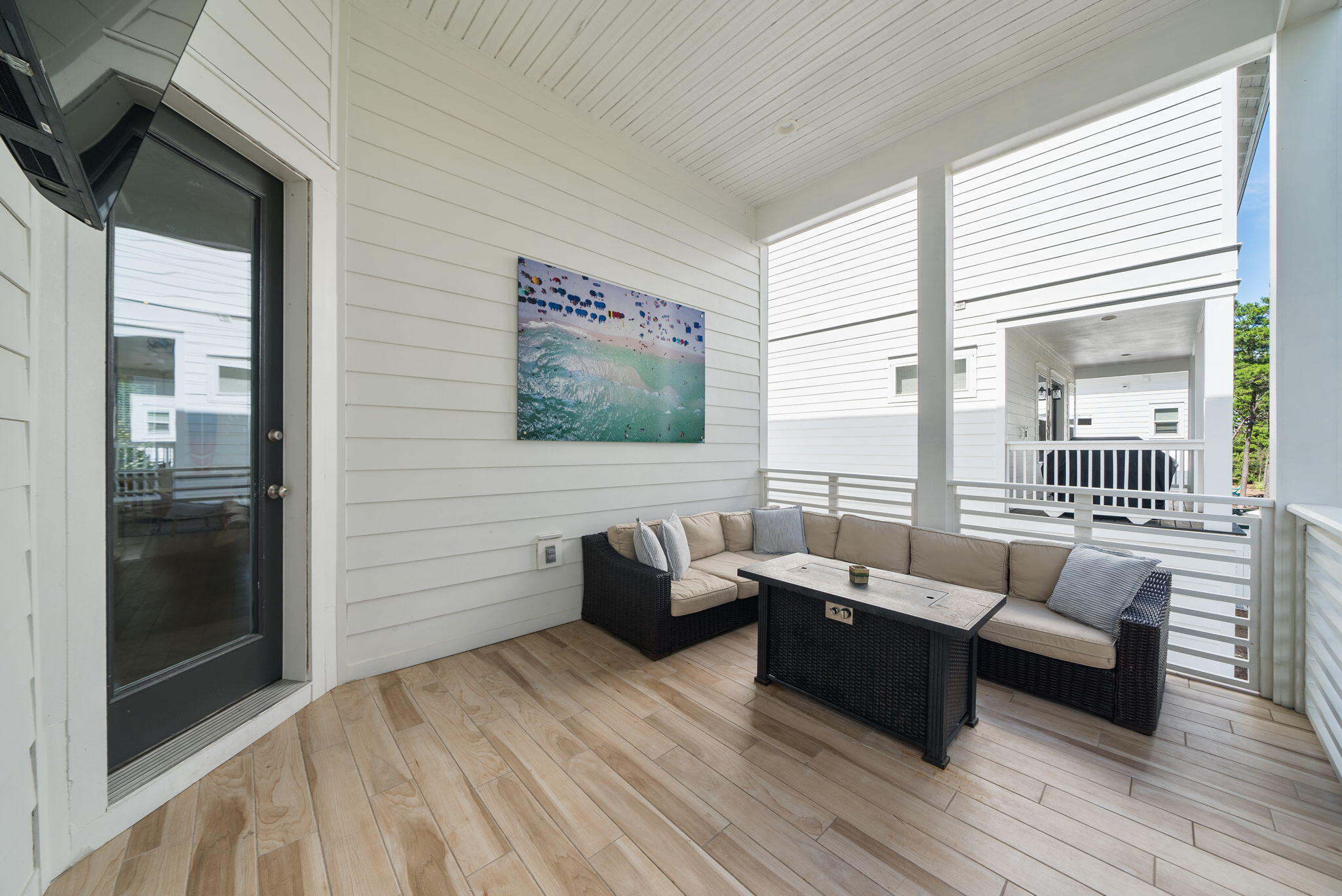 178 Valdare Ln Inlet Beach Inlet Beach, FL 32461 - Photo 33 of 58 a living room with furniture and a flat screen tv