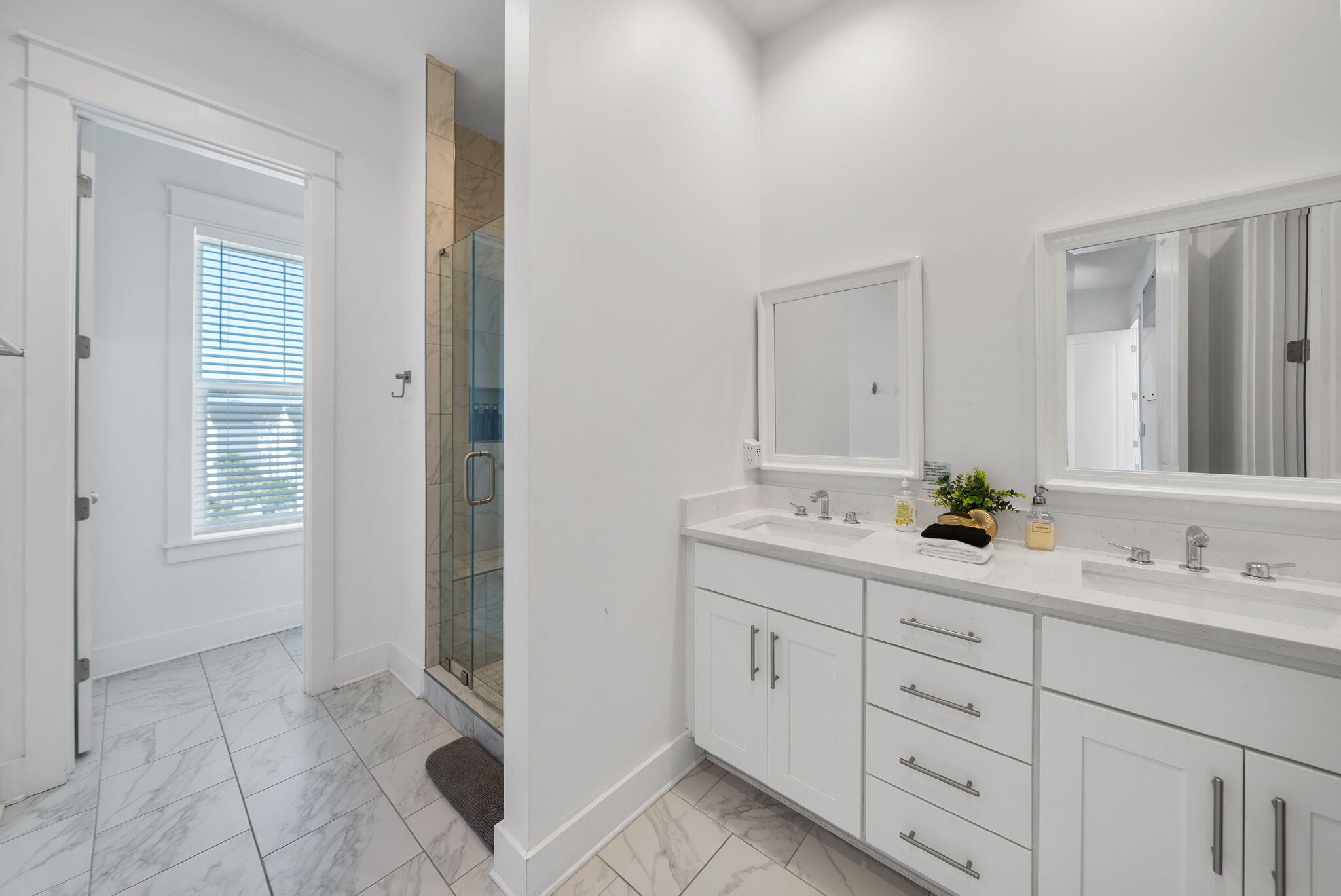178 Valdare Ln Inlet Beach Inlet Beach, FL 32461 - Photo 45 of 58 a bathroom with a double vanity sink a mirror and a bathtub
