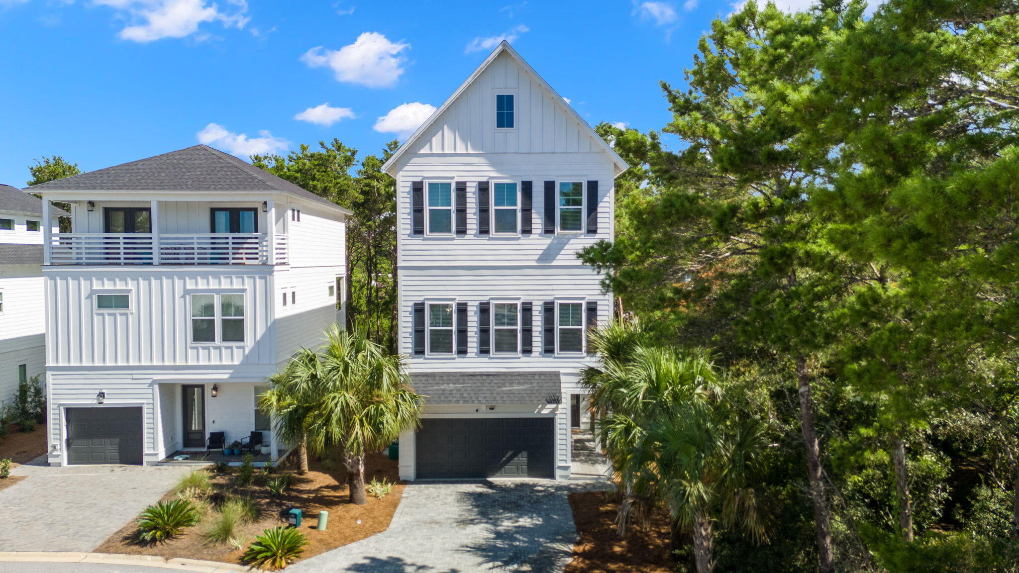 178 Valdare Ln Inlet Beach Inlet Beach, FL 32461 - Photo 56 of 58 a front view of a house with a yard