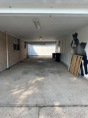 a view of a livingroom with furniture and a rug