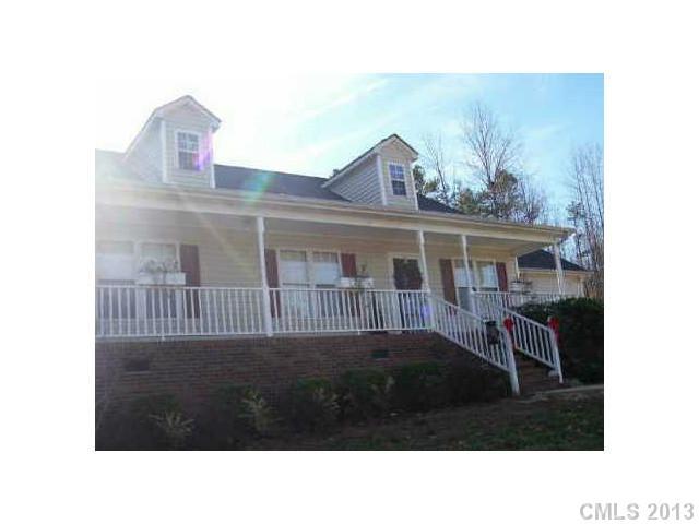 734 Cove Road Gastonia, NC 28052 - Photo 2 of 3 a black and white photo of a house