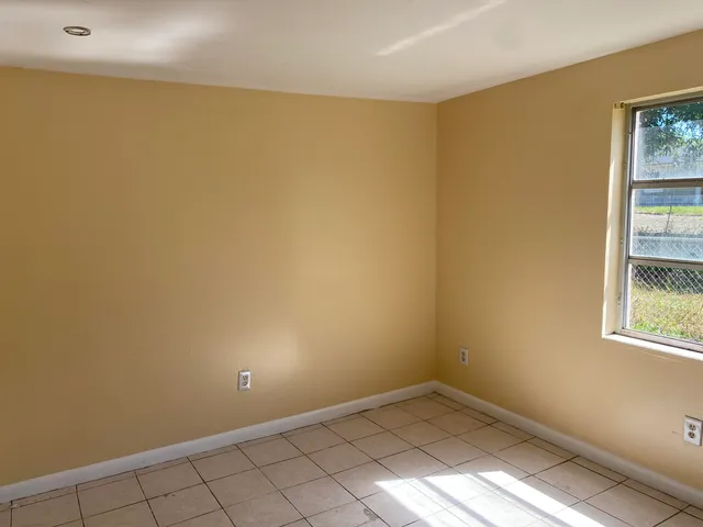 a view of an empty room with window