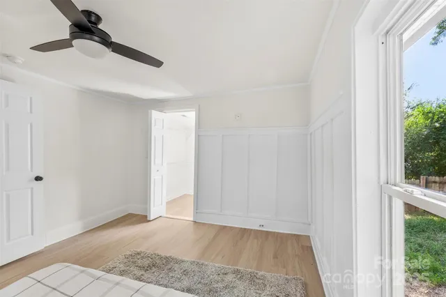 a view of a small space with racks on the wall