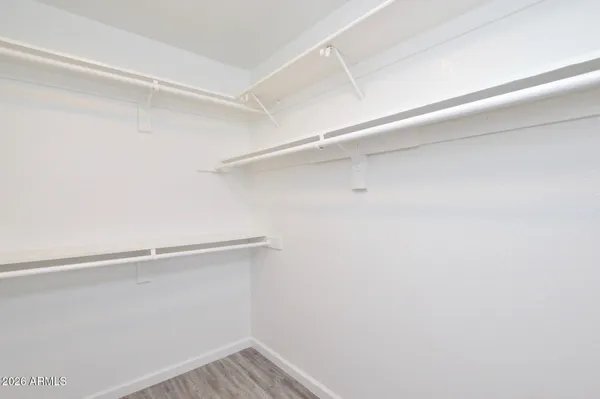 a view of an empty walk in closet