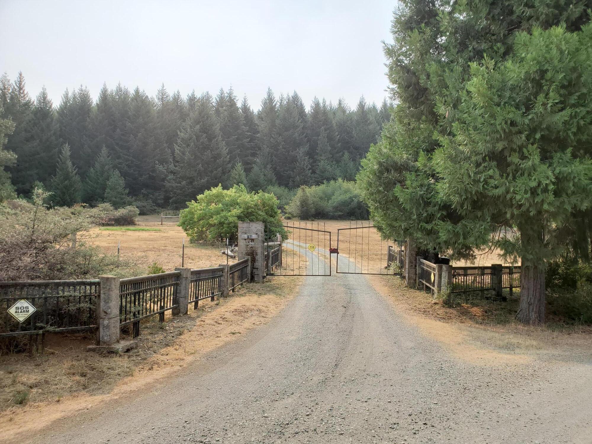 150 Rattlesnake Road Glendale, OR 97442 - Photo 2 of 67 Coming in through your gated, well maintained road to your 94.24 Acres of secluded serenity