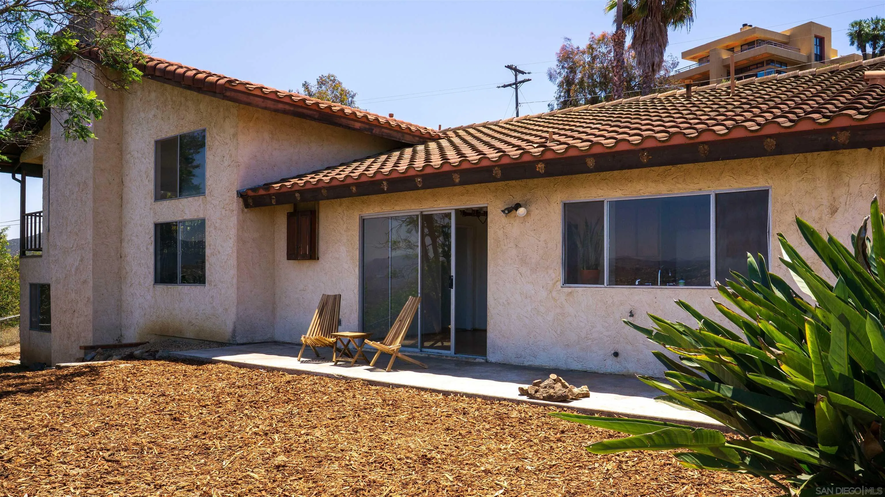 3041 Millar Ranch Road Spring Valley, CA 91978 - Photo 4 of 4 a front view of a house with a yard