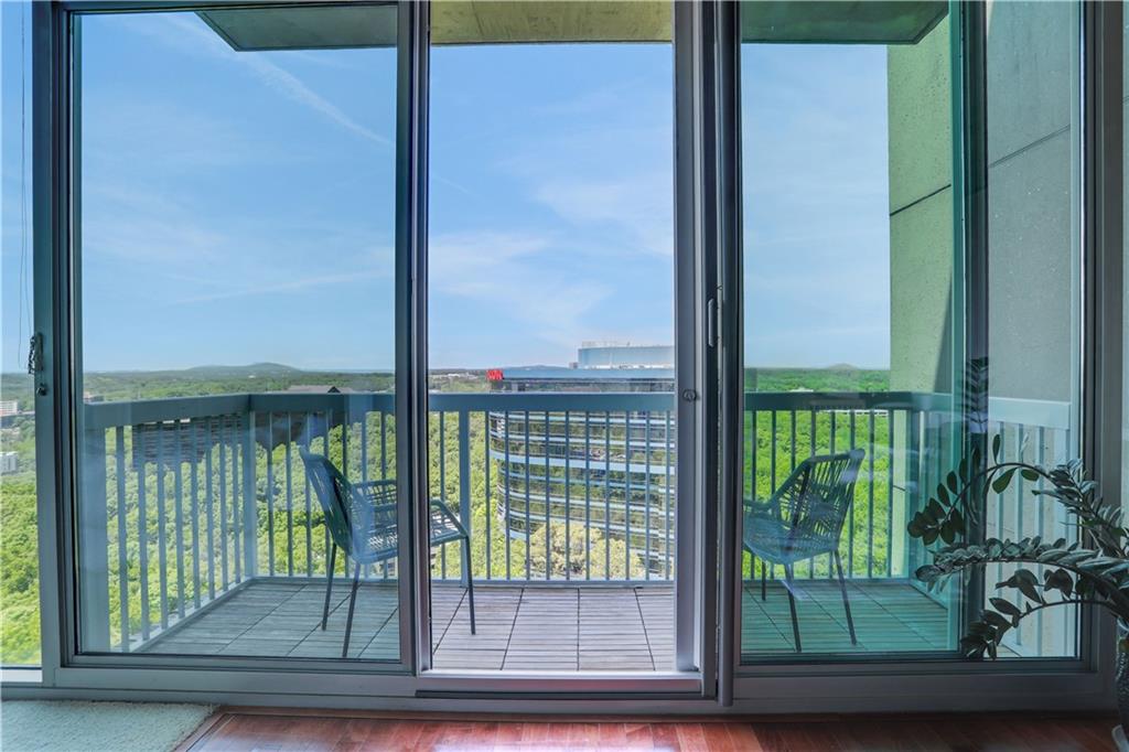 3300 Windy Ridge Parkway Southeast, Unit 1603 Atlanta, GA 30339 - Photo 20 of 36 a view of backyard from window