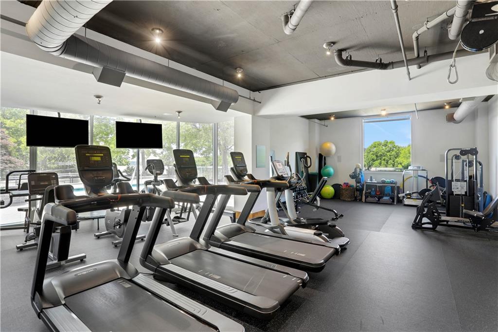 3300 Windy Ridge Parkway Southeast, Unit 1603 Atlanta, GA 30339 - Photo 24 of 36 a view of a room with gym equipment