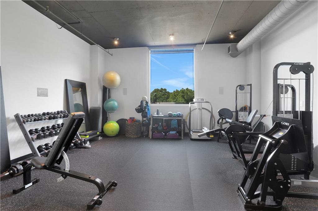 3300 Windy Ridge Parkway Southeast, Unit 1603 Atlanta, GA 30339 - Photo 25 of 36 a room with gym equipment