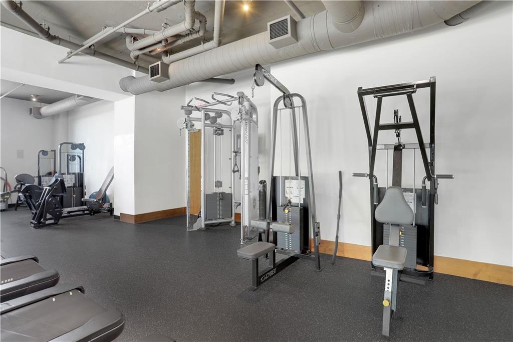 3300 Windy Ridge Parkway Southeast, Unit 1603 Atlanta, GA 30339 - Photo 27 of 36 a view of a room with gym equipment