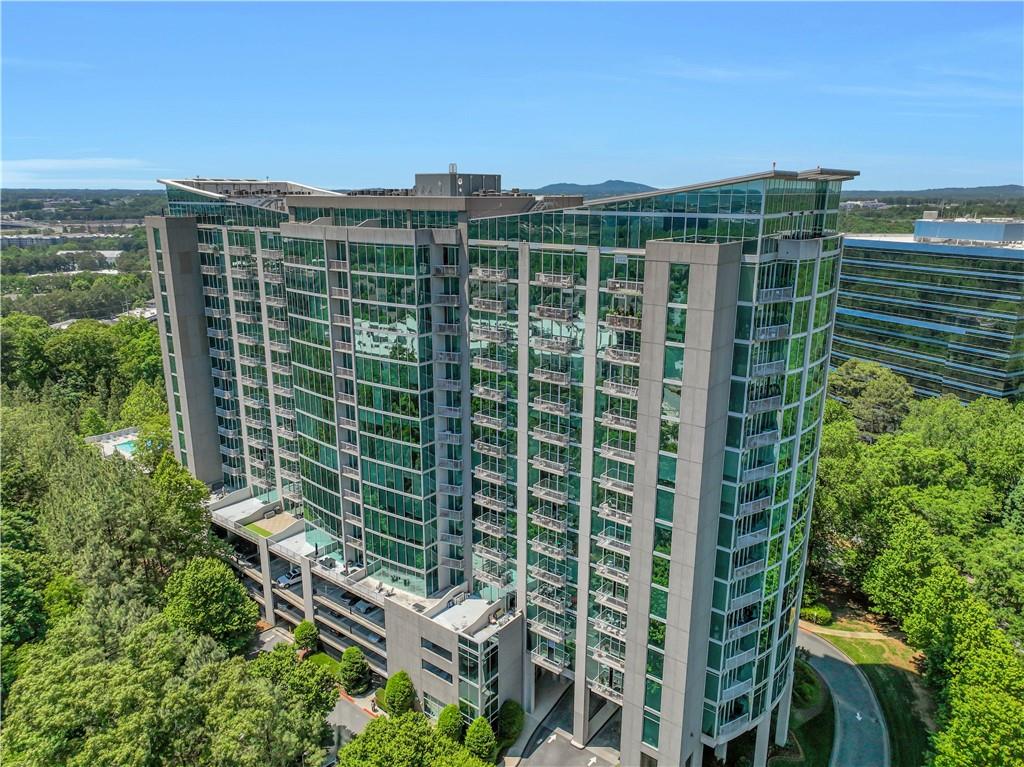 3300 Windy Ridge Parkway Southeast, Unit 1603 Atlanta, GA 30339 - Photo 28 of 36 a view of a building from a garden