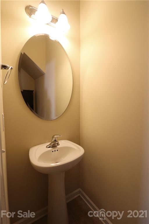 440 Danielle Way Fort Mill, SC 29715 - Photo 18 of 19 a bathroom with a sink and mirror