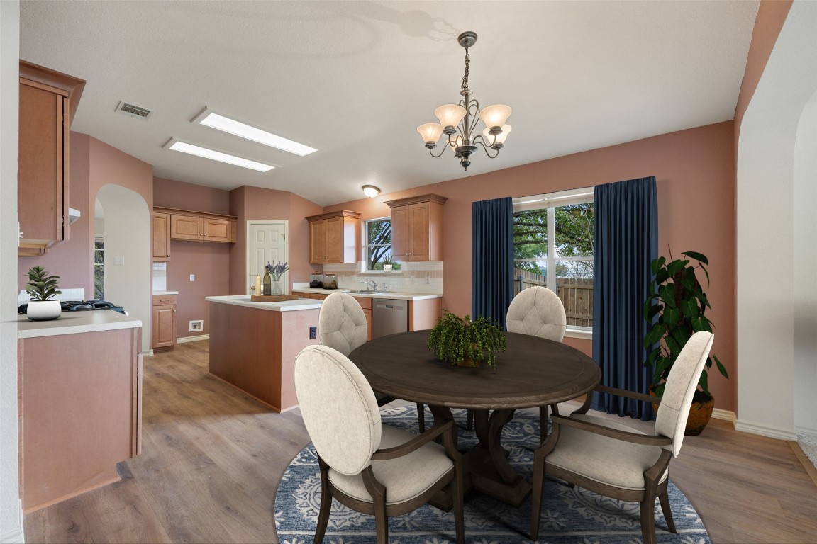 1201 Rice Avenue Cedar Park, TX 78613 - Photo 13 of 40 Virtually staged~
Nice sized dining area~