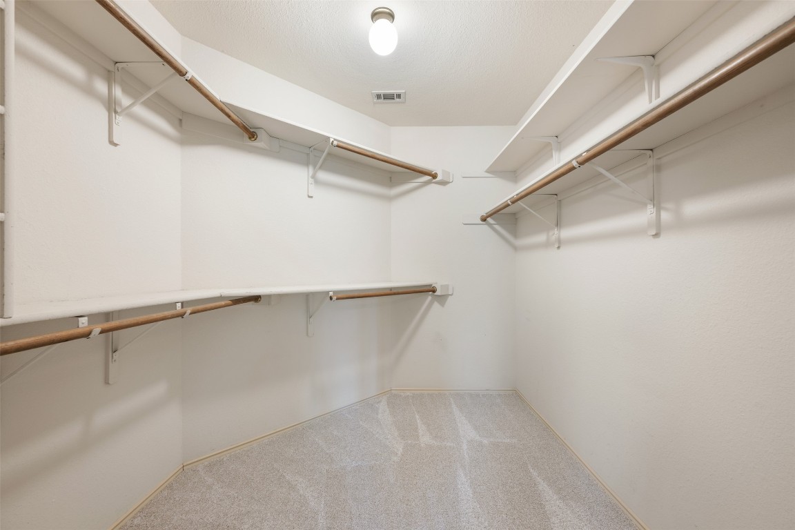 1201 Rice Avenue Cedar Park, TX 78613 - Photo 26 of 40 Primary bedroom closet-lots of hanging and storage room~