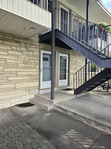 a view of a house with a street