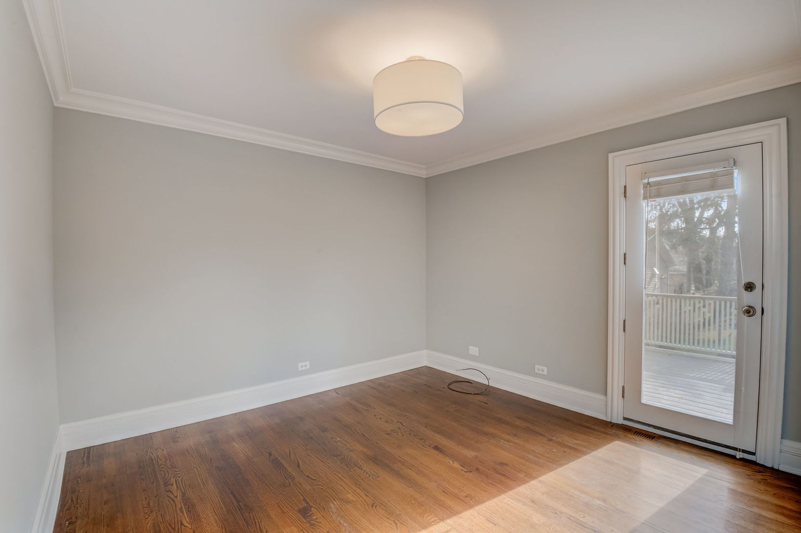 1673 East Algonquin Road Des Plaines, IL 60016 - Photo 19 of 36 wooden floor in an empty room