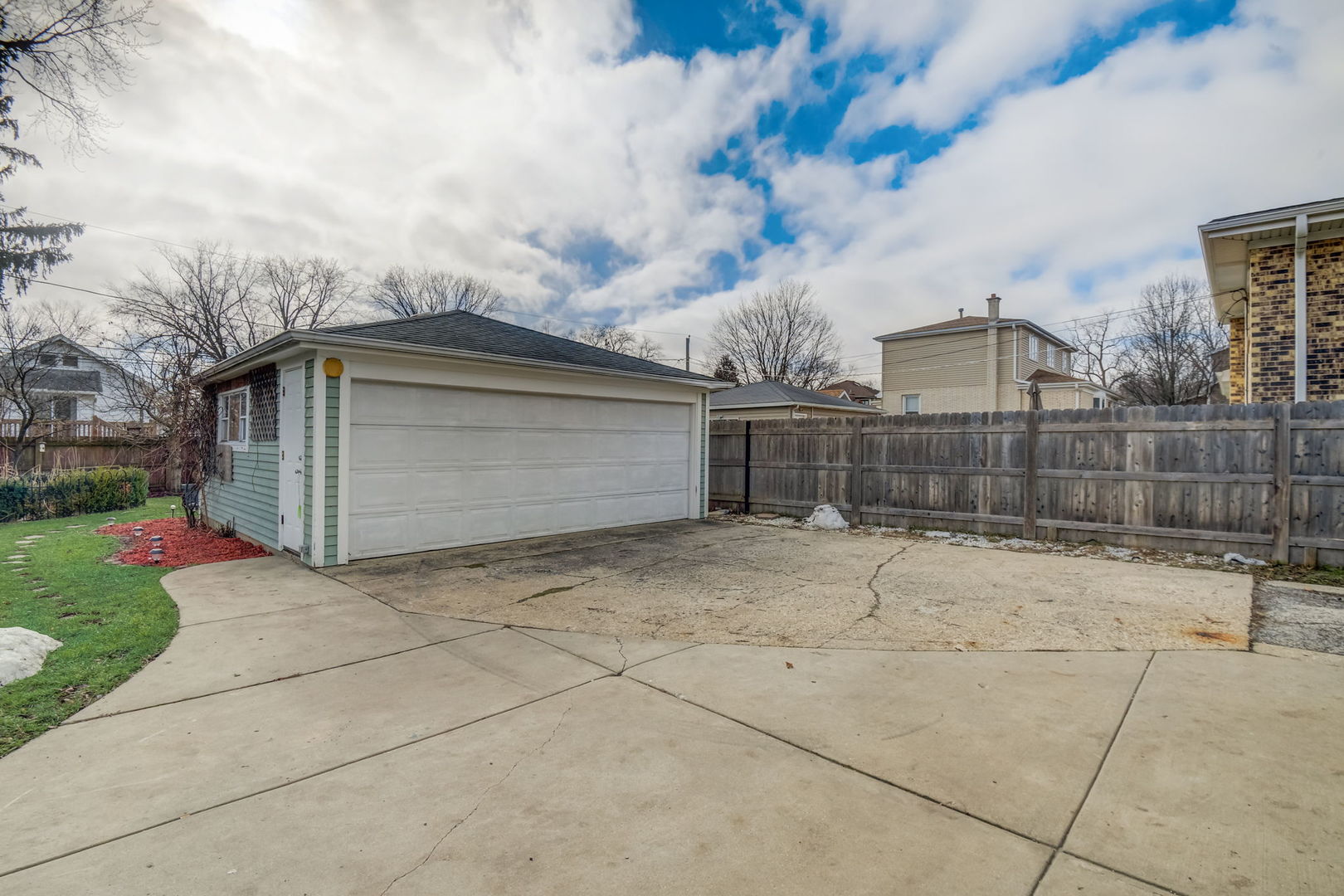1673 East Algonquin Road Des Plaines, IL 60016 - Photo 28 of 36 a view of a house with a snow