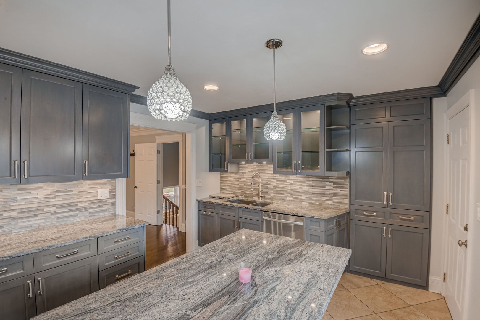 1673 East Algonquin Road Des Plaines, IL 60016 - Photo 7 of 36 a kitchen with stainless steel appliances granite countertop wooden floor sink and refrigerator