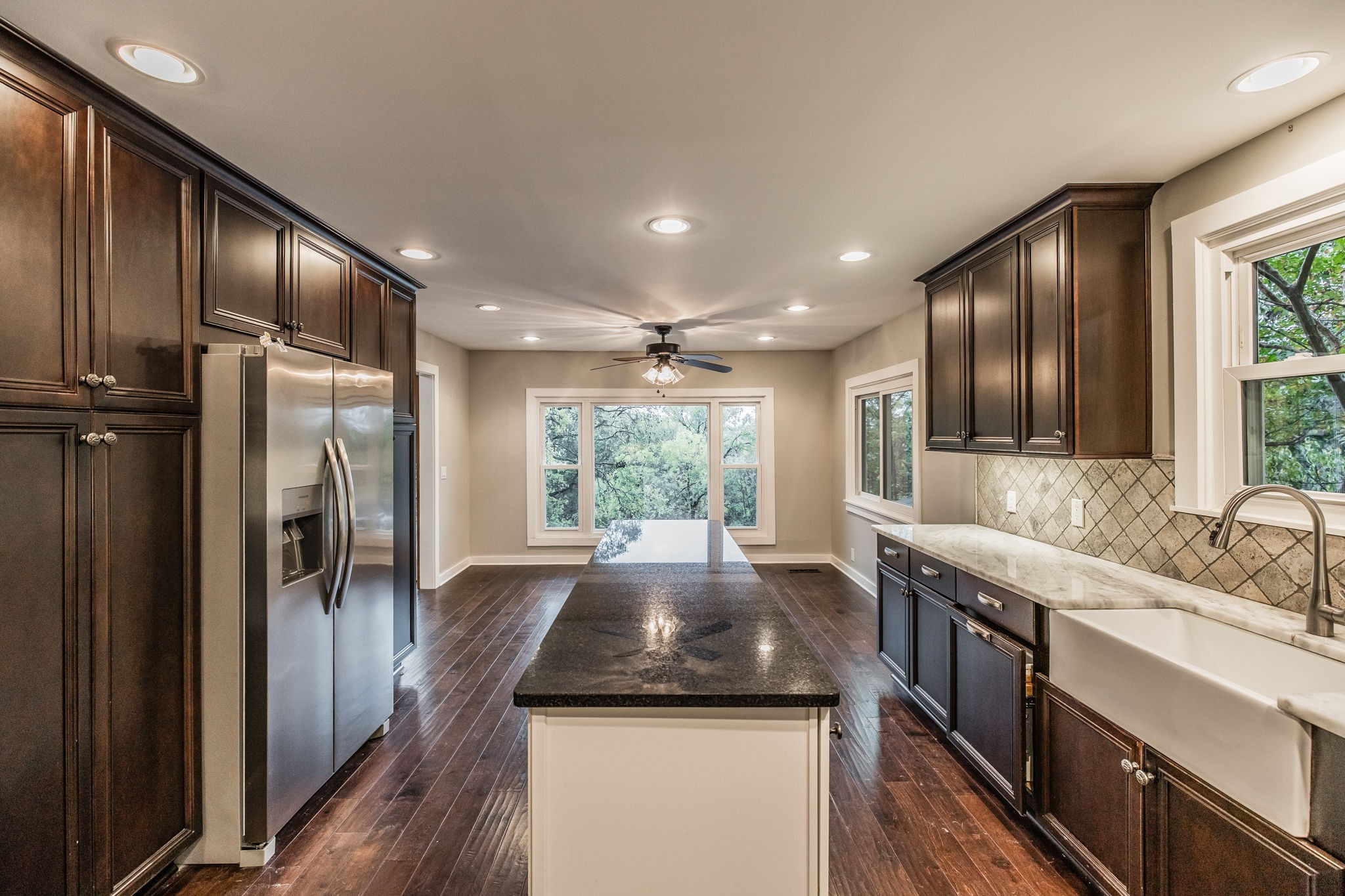 181 Lake Valley Road Hendersonville, TN 37075 - Photo 17 of 60 a kitchen with stainless steel appliances granite countertop a sink stove and refrigerator