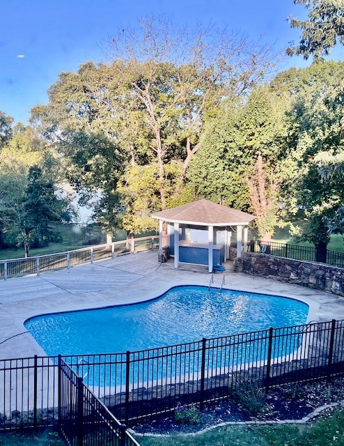 181 Lake Valley Road Hendersonville, TN 37075 - Photo 4 of 60 a view of a chairs and table on the wooden floor