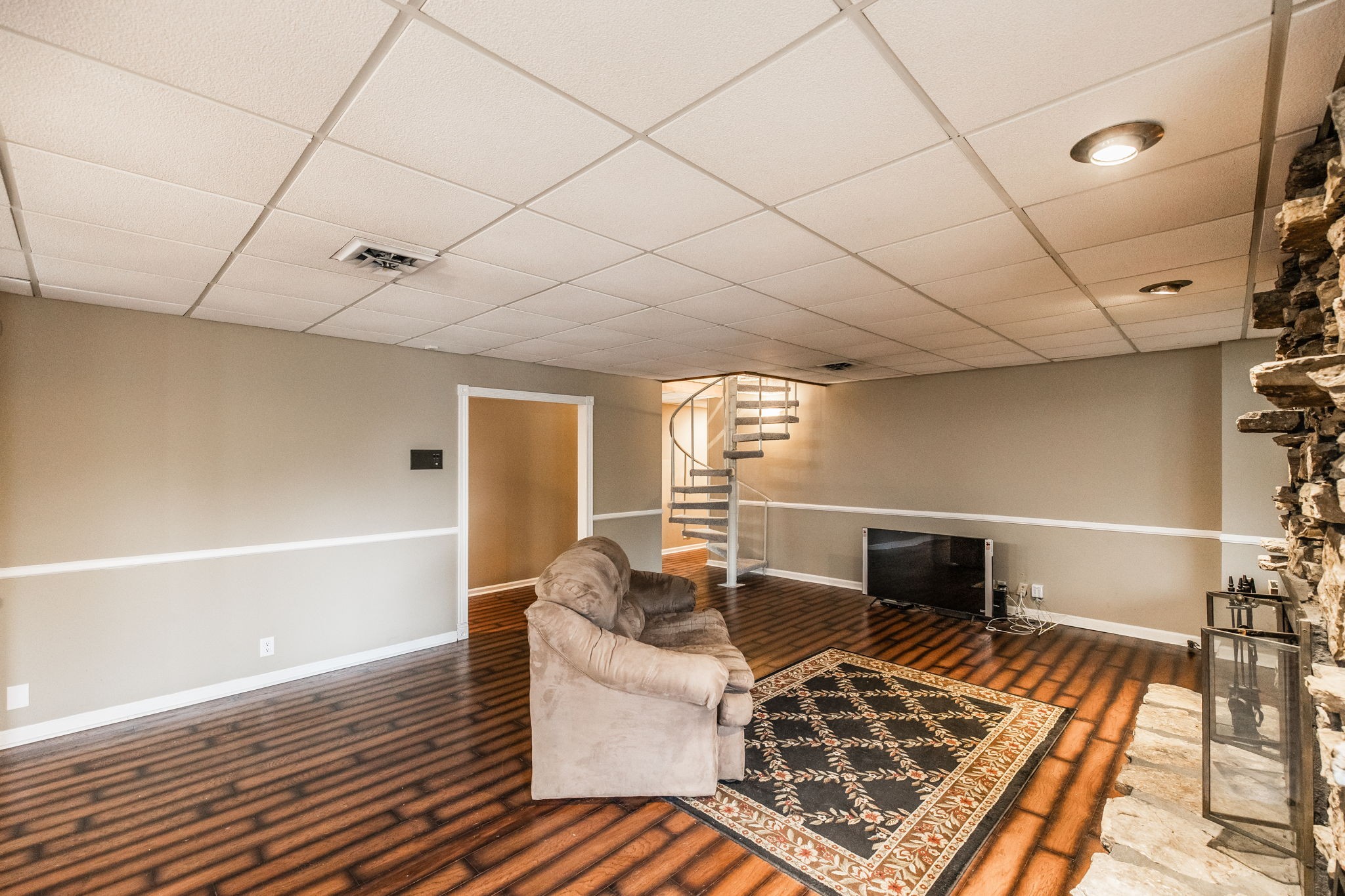 181 Lake Valley Road Hendersonville, TN 37075 - Photo 47 of 60 a living room with a couch and a coffee table
