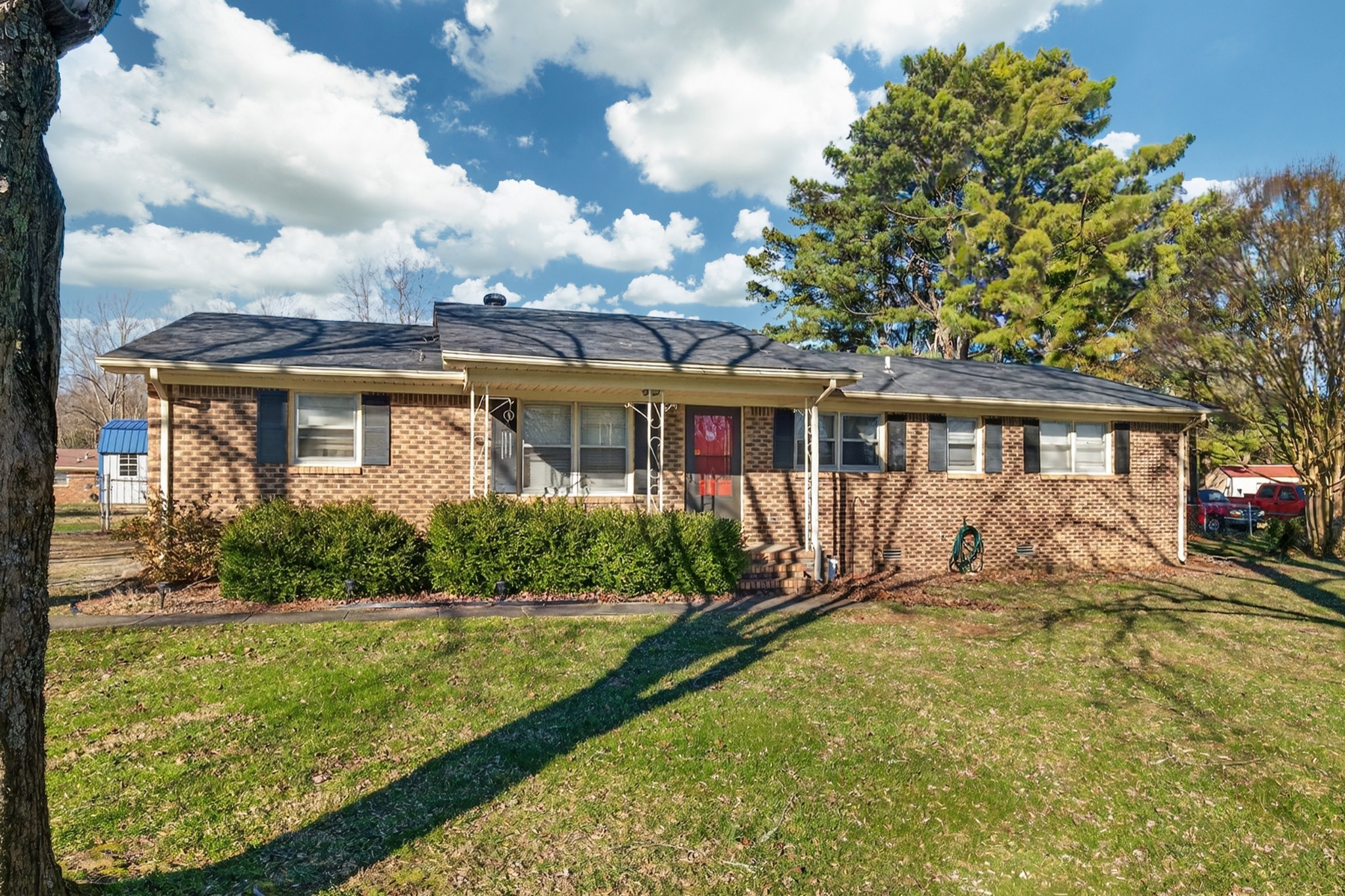 3 Park City Heights Road Fayetteville, TN 37334 - Photo 1 of 32 a view of a house with swimming pool and a yard