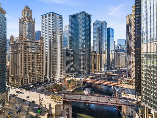 a view of city with tall buildings