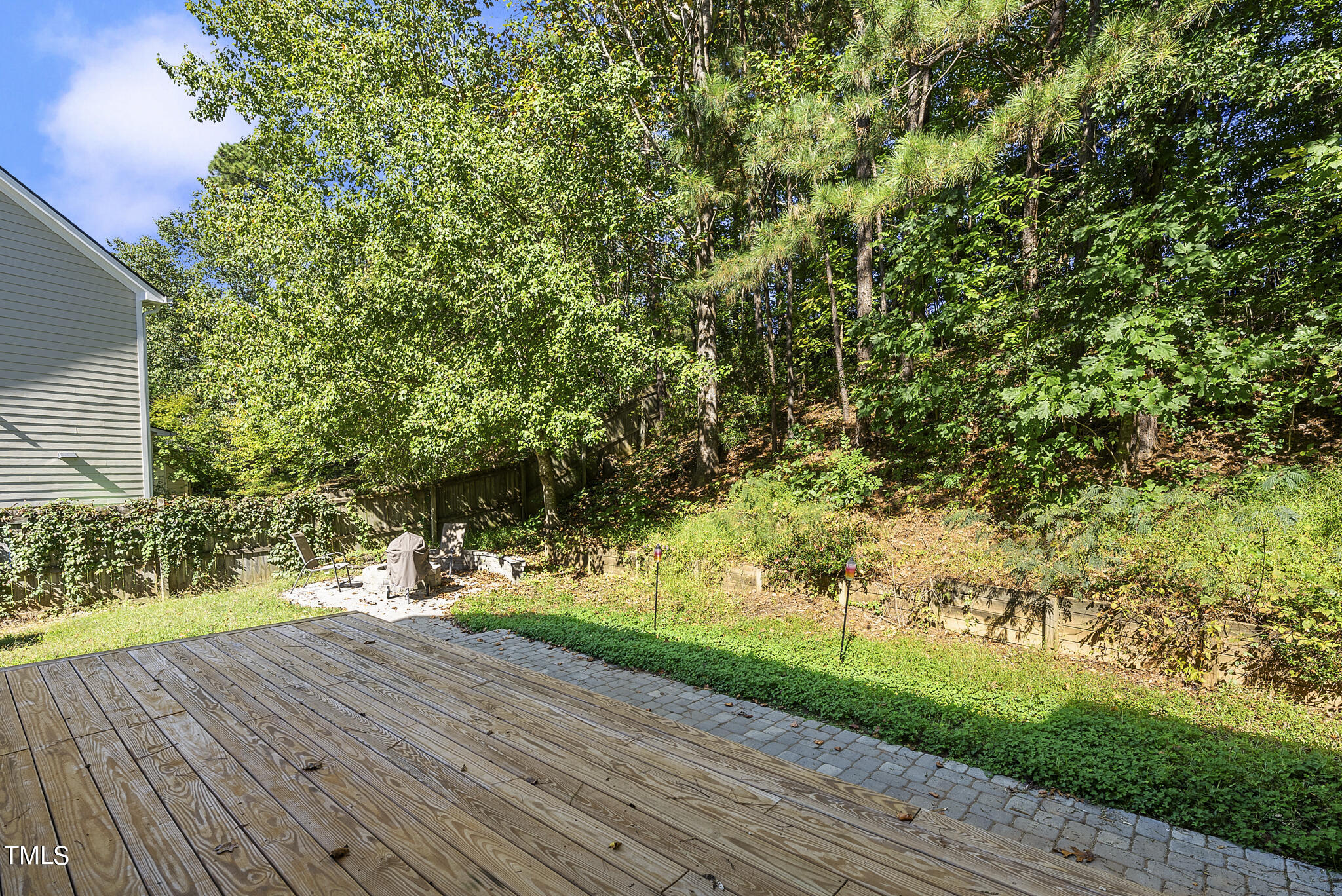 6709 Holly Mill Court Raleigh, NC 27613 - Photo 30 of 36 a view of a pathway with a garden
