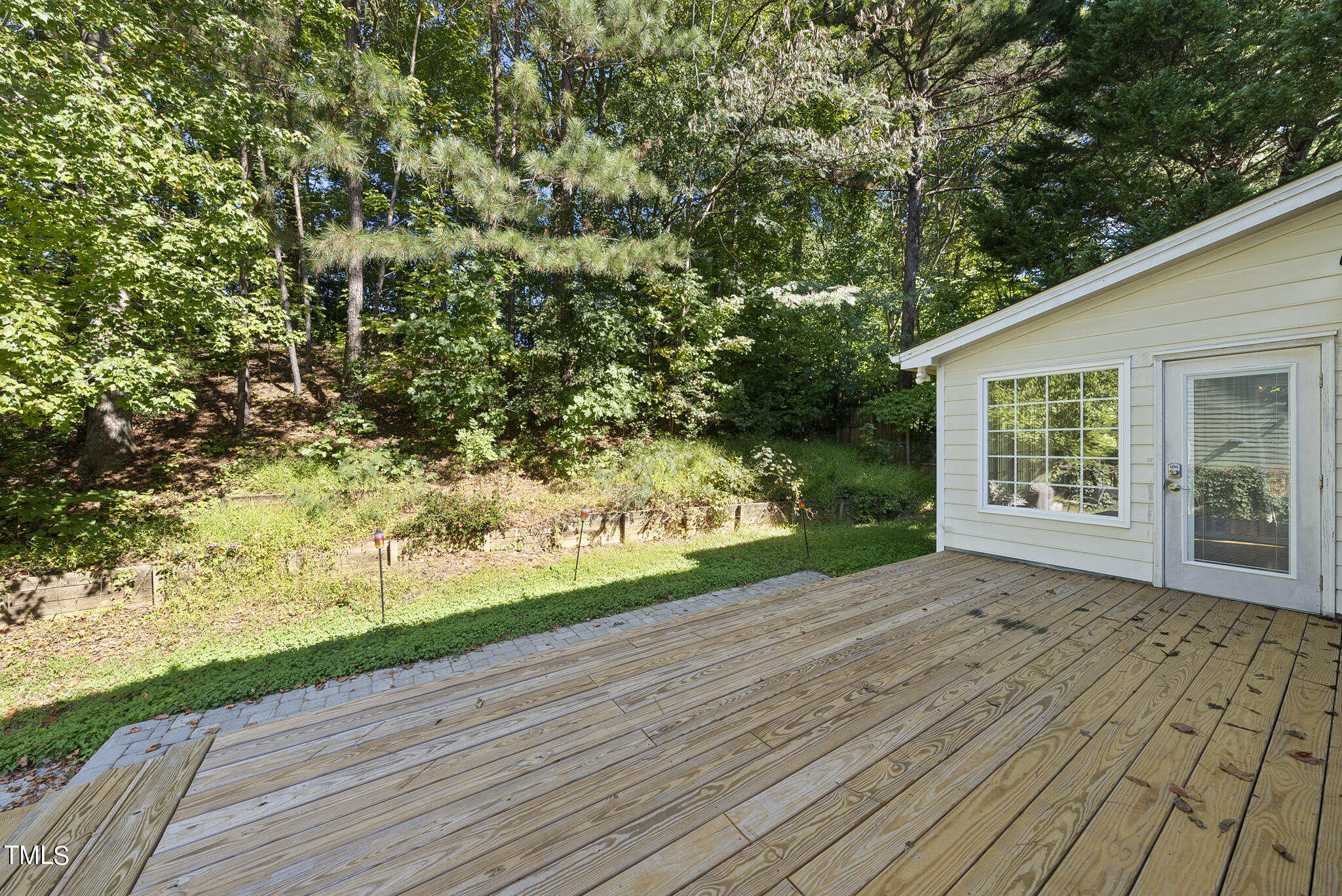 6709 Holly Mill Court Raleigh, NC 27613 - Photo 32 of 36 a view of backyard with green space