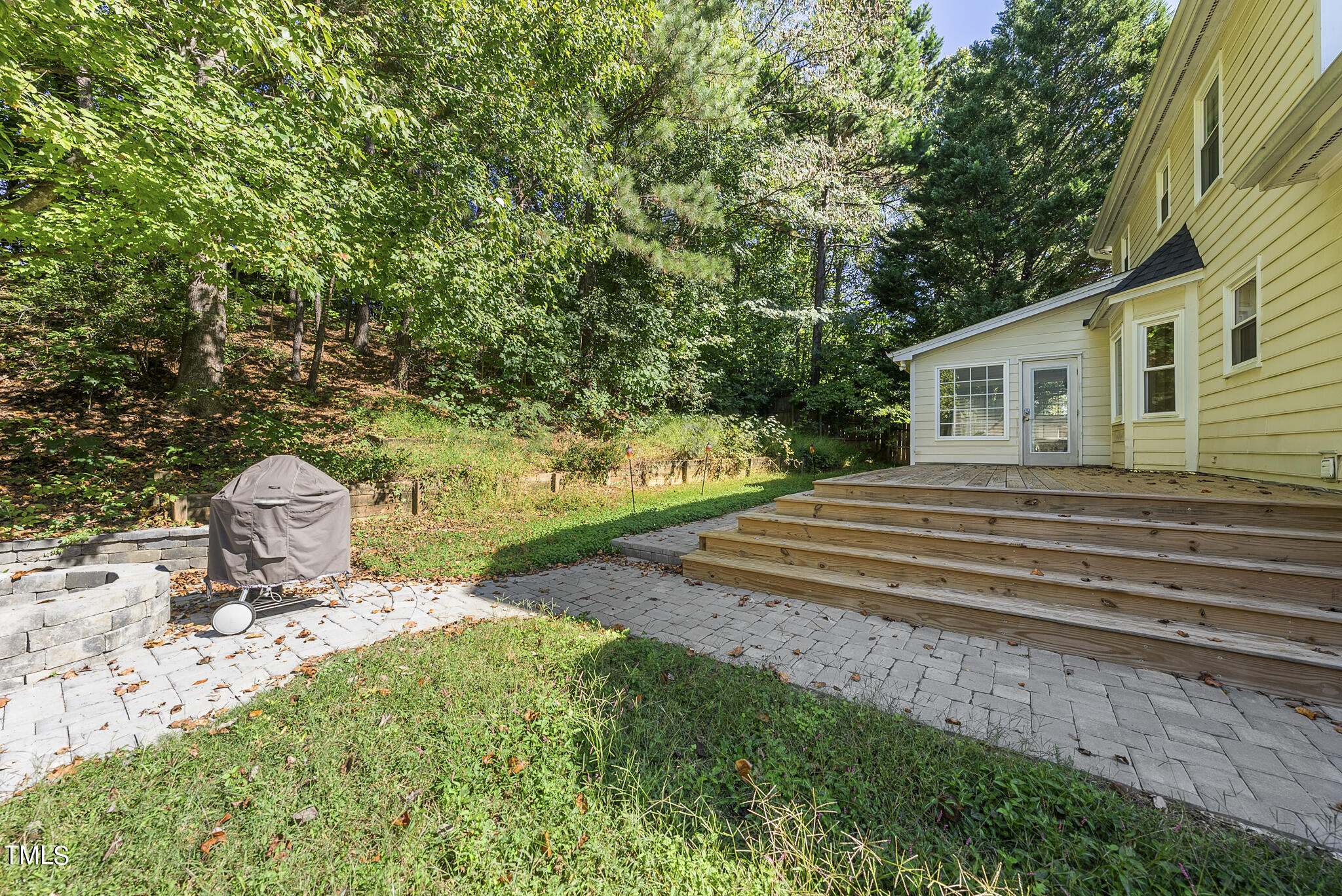 6709 Holly Mill Court Raleigh, NC 27613 - Photo 35 of 36 a view of a house with a yard