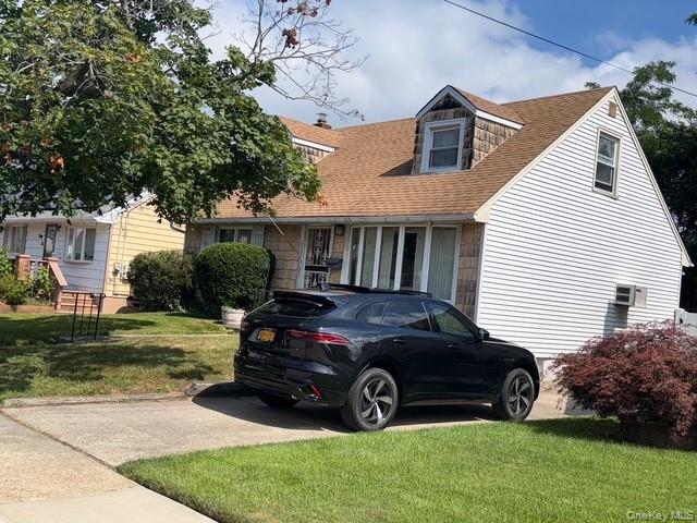 a car parked in front of a house