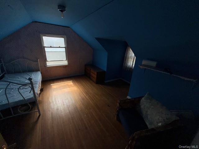 35 Marlow Road Valley Stream, NY 11580 - Photo 12 of 19 Bonus room with wood finished floors and vaulted ceiling