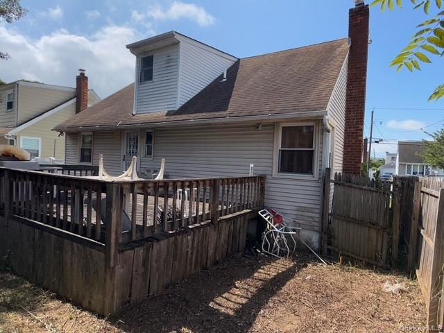 35 Marlow Road Valley Stream, NY 11580 - Photo 6 of 20 a view of a house with wooden deck front of house